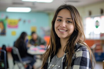 Wall Mural - Portrait of a smiling young Hispanic female volunteer at community center