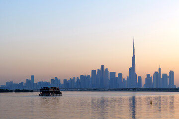 Wall Mural - amazing sunset view of Dubai Downtown cityline from Dubai Creek