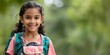 © Anastasiia - Cheerful Indian girl with backpack ready for school or hiking adventure. Concept Adventure, School, Indian Culture, Backpack, Cheerful
