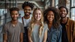 © svastix - A group of diverse friends smiles broadly and poses together inside a stylish modern building, embodying friendship, unity, and joyful coexistence in a bright lively setting.