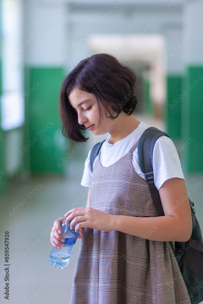 Beautiful girl in a school corridor posing for the camera Stock Photo ...