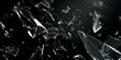 © B-Ast-BRT - Dynamic glass texture featuring shattered pieces with bits and shards exploding in the air. Black backdrop contrasting with the fragments of broken glass pieces. Blur and bokeh motion effect.