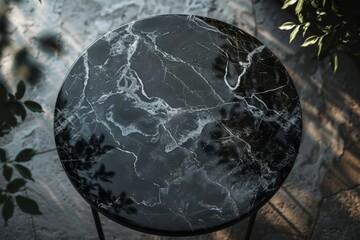 Canvas Print - Aerial view of round black marble table