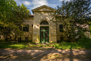 Wall Mural - Old historic haunted orphanage in an abandoned palace in Hungary