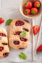 Wall Mural - Delicious and sweet strawberry yeast cake with crumble and glaze.