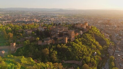 Wall Mural - Aerial view of the Alhambra palace at sunset in Granada, Andalusia, Spain