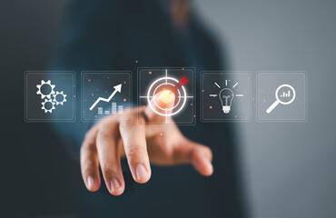 Poster - Business goal and target success concept, businessman holding goal of becoming a leader investing in assets Business and finance, arrow up, global economic trend analysis, Financial graph analysis.