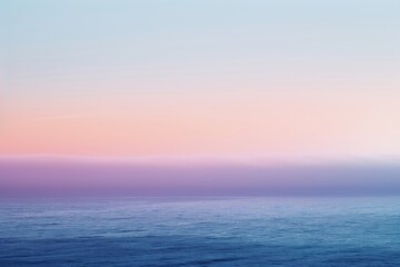 Serene twilight landscape with ocean and smooth gradients of purple and pink, ideal for calm and tranquil themes in art or design.

