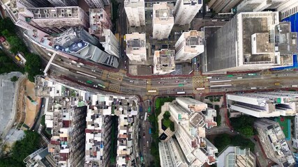 Sticker - North Point, Hong Kong: Aerial overhead footage of the very crowded North Point residential and commercial district along the King's road in Hong Kong island. 
