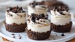 © Alexander - Mini cookies and cream cheesecakes