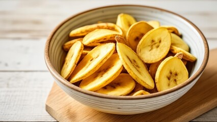 Wall Mural -  Deliciously crispy banana chips in a bowl