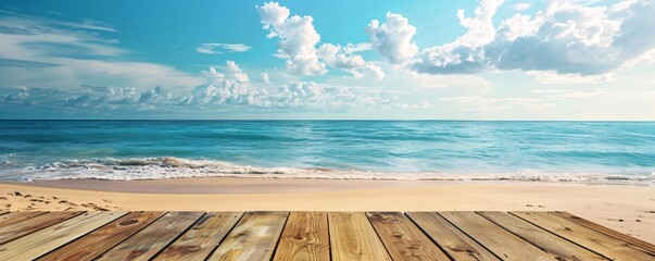 Wall Mural - Empty wooden platform overlooking a beautiful beach with turquoise water and blue sky