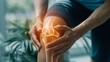 © Jayk - Close up of hands on knee pain