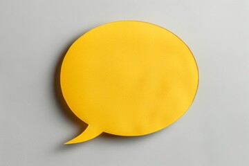 Wall Mural - Yellow Speech Bubble on Gray Background