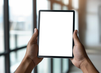 Close up Mockup of hands holding an empty blank tablet screen, office background