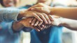 © Gia - This image showcases several hands placed on top of each other, representing teamwork, unity, collaboration, and mutual support, essential in any group effort.