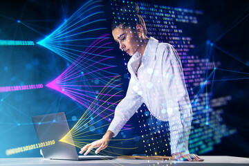 Poster - Attractive young european businesswoman using laptop on desk with creative big data lines on dark background. Technology and innovation concept. Double exposure.