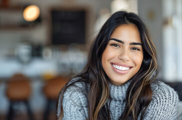 Wall Mural - Smiling Woman in a Cozy Sweater.