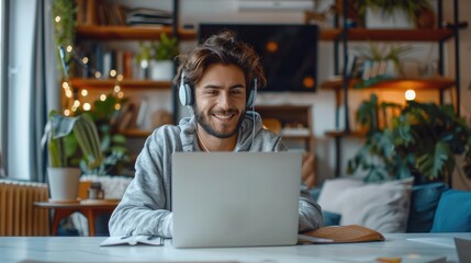 Aufkleber - A man smiling using a laptop on a video call, with headphones, in office, in the morning. Generative AI.