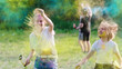 © Ievgen Skrypko - Sisters Tossing Dry Bright Paint On Holi Festival