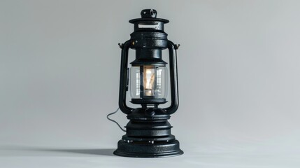 Aufkleber - A black lantern with a glowing light on top, often used for outdoor or nighttime scenes