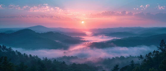 Poster - A beautiful mountain range with a sun setting in the background. The sky is a mix of blue and orange, creating a serene and peaceful atmosphere