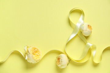 Wall Mural - Composition with figure 8 made of ribbon and peony buds on yellow background. International Women's Day celebration