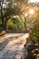 Poster - Sunlight Bathes a Stone Pathway in a Tranquil Garden