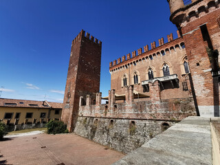 Carimate Castle overview of the external walls on a sunny day , generated by AI. High quality photo