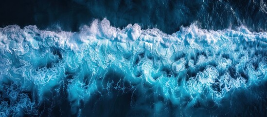 Wall Mural - Aerial View of Ocean Waves Breaking