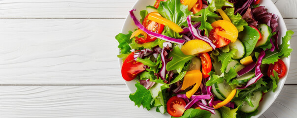 Canvas Print - A colorful salad is on a white plate