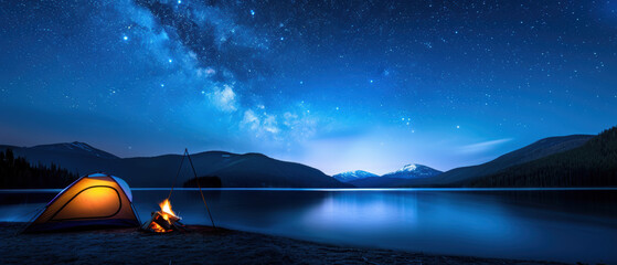 a small tent is set up next to a lake at night