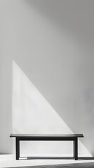 Wall Mural - Minimalist Black Table Against Bright White Backdrop for Product Display