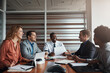 © Reese Coop/peopleimages.com - Business people, team and meeting with paperwork or data analytics for financial report, solution or collaboration. Accounting analyst and group talking or listening to ideas of graphs or statistics