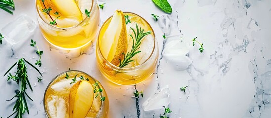 Leinwandbilder - Fresh cocktail with pear, ice and herbs on the table. Refreshing drink on a hot summer day. Ice tea. Pear sangria or punch in a glass. with copy space image. Place for adding text or design