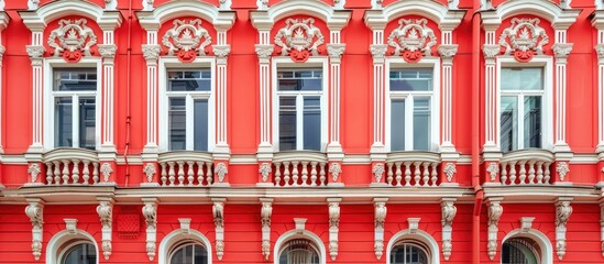 Aufkleber - fragment of the facade of a red multi-storey building with windows, balcony and decorative elements. with copy space image. Place for adding text or design