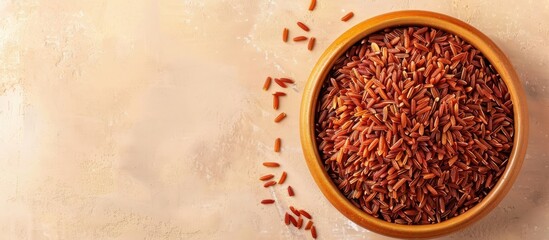 Aufkleber - Cooked red riced in a bowl on pastel background Food. with copy space image. Place for adding text or design