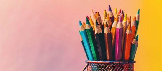 Poster - Colored pencils stand in the case isolated pastel background. with copy space image. Place for adding text or design