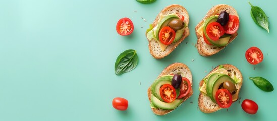Aufkleber - Toast sandwiches with avocado, tomatoes and olives. Isolated on pastel background. Top view. with copy space image. Place for adding text or design