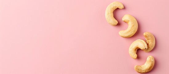 Aufkleber - Tasty organic cashew nut isolated on pastel background. with copy space image. Place for adding text or design