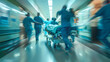 © safu designe - Medical team rushing patient on gurney through hospital corridor to operating theater with motion blur effect. Concept Emergency Response, Hospital Life, Medical Procedures, Critical