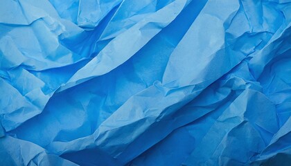 Wall Mural - crumpled blue paper texture background
