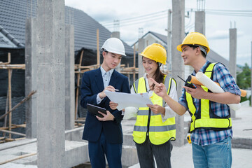 Wall Mural - Group architect team on construction site inspection documents and business workflow in the morning.