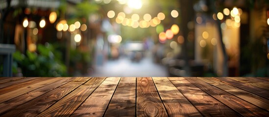 Wall Mural - empty wood table with blur montage coffee shop or restaurant background. Copy space image. Place for adding text and design