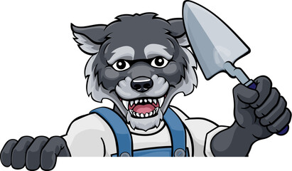 Wall Mural - A wolf bricklayer builder construction worker mascot cartoon character holding a trowel tool and peeking over a sign