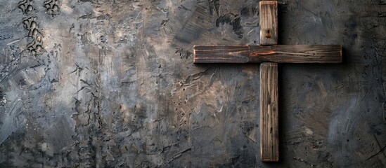 Wall Mural - Wooden Christian cross with concrete background. Christianity Concept. Faith hope love concept. Copy space image. Place for adding text and design