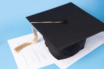 Education documents, graduation cap and exam papers, graduate receiving diploma, high school ceremony, academic success