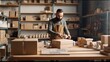 © Nataliya - Man packing ceramic cups in carton box in his workshop