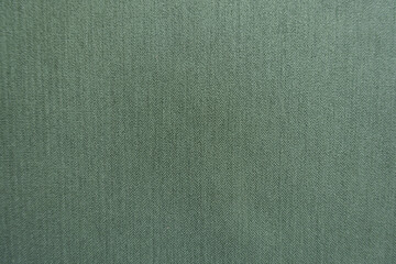 Sticker - Surface of reseda green polyester fabric with herringbone pattern