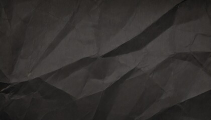 Wall Mural - crumpled black paper texture background